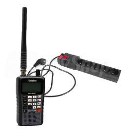 HBS-01 wiretap kit with a bug in a UE-type power strip and with Uniden scanner